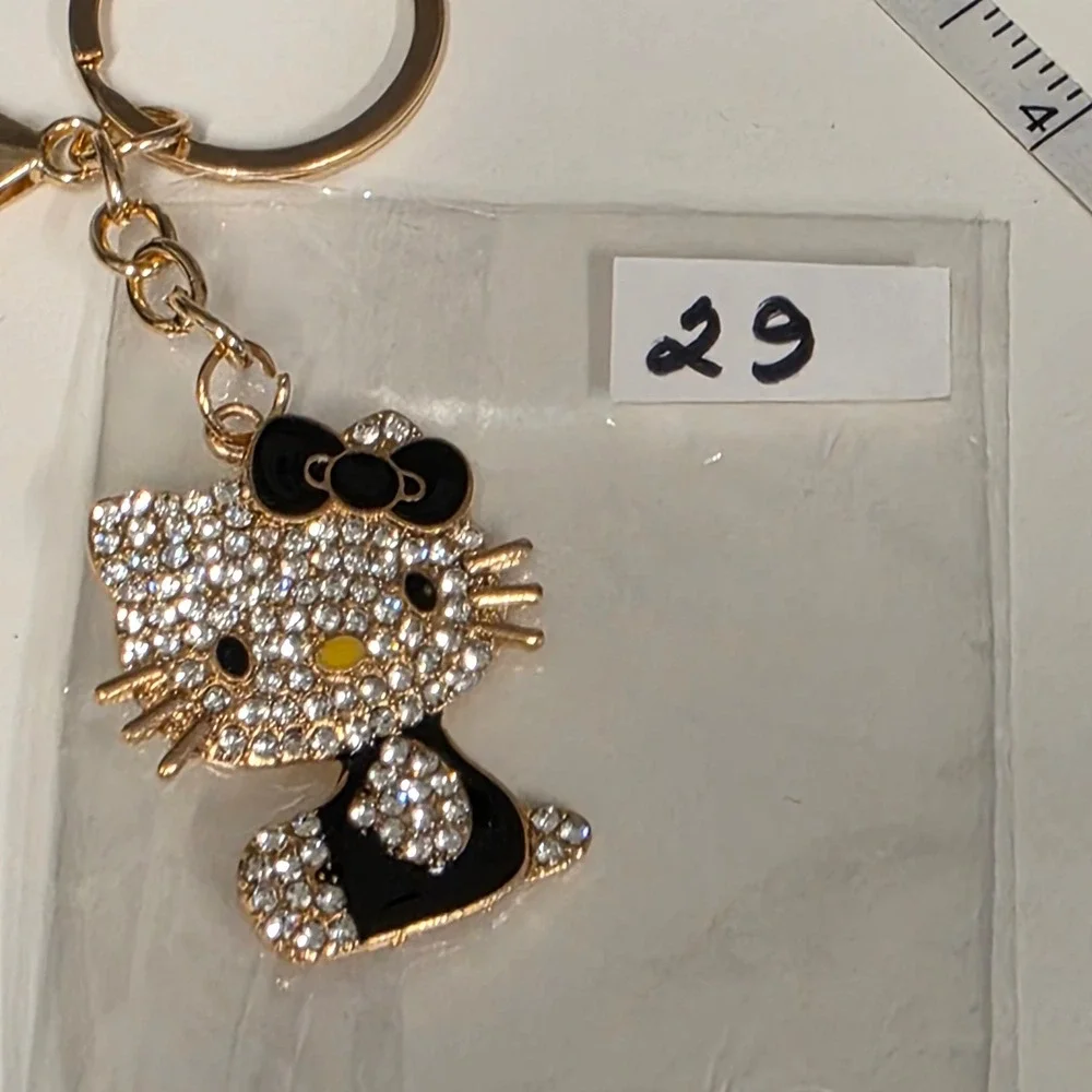Sanrio Hello Kitty Rhinestone Keychain Gold Tone Black Bow Bag Charm Accessory